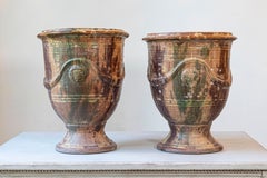 Pair of French 19th Century Anduze Jars with Brown and Green Glaze and Swags