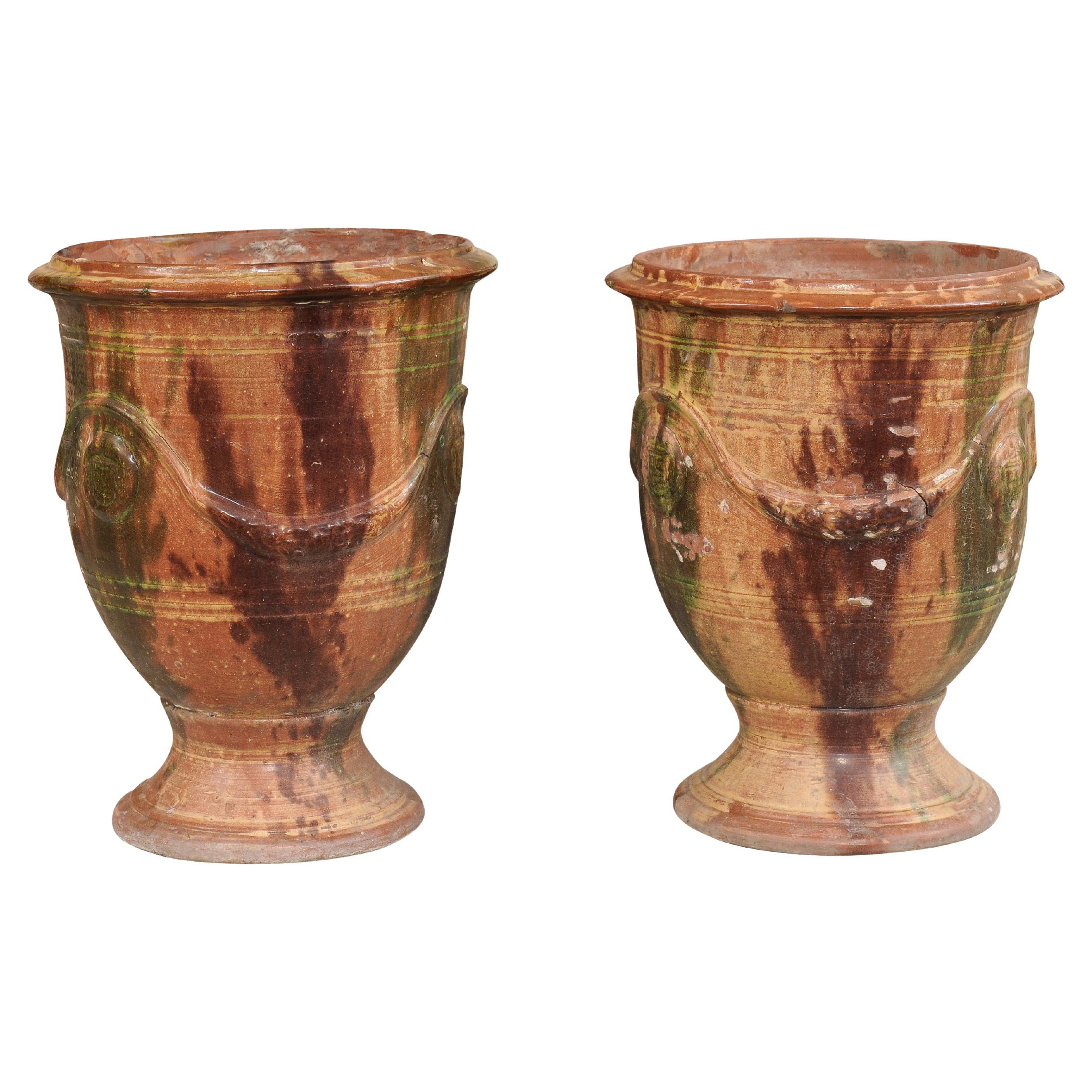 Pair of French 19th Century Anduze Jars with Brown and Green Glaze and Swags For Sale