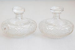 Pair of French 19th Century Baccarat Crystal Perfume Bottles with Cutaway Motifs