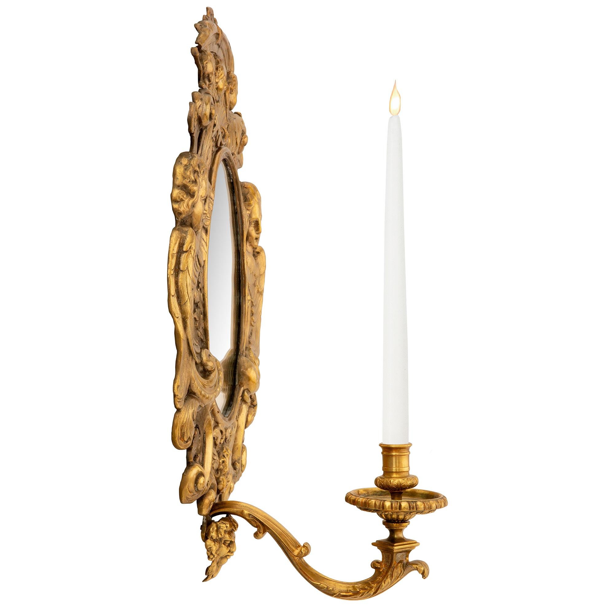 Pair of French 19th Century Baroque Style Ormolu Mirrored Sconces In Good Condition For Sale In West Palm Beach, FL
