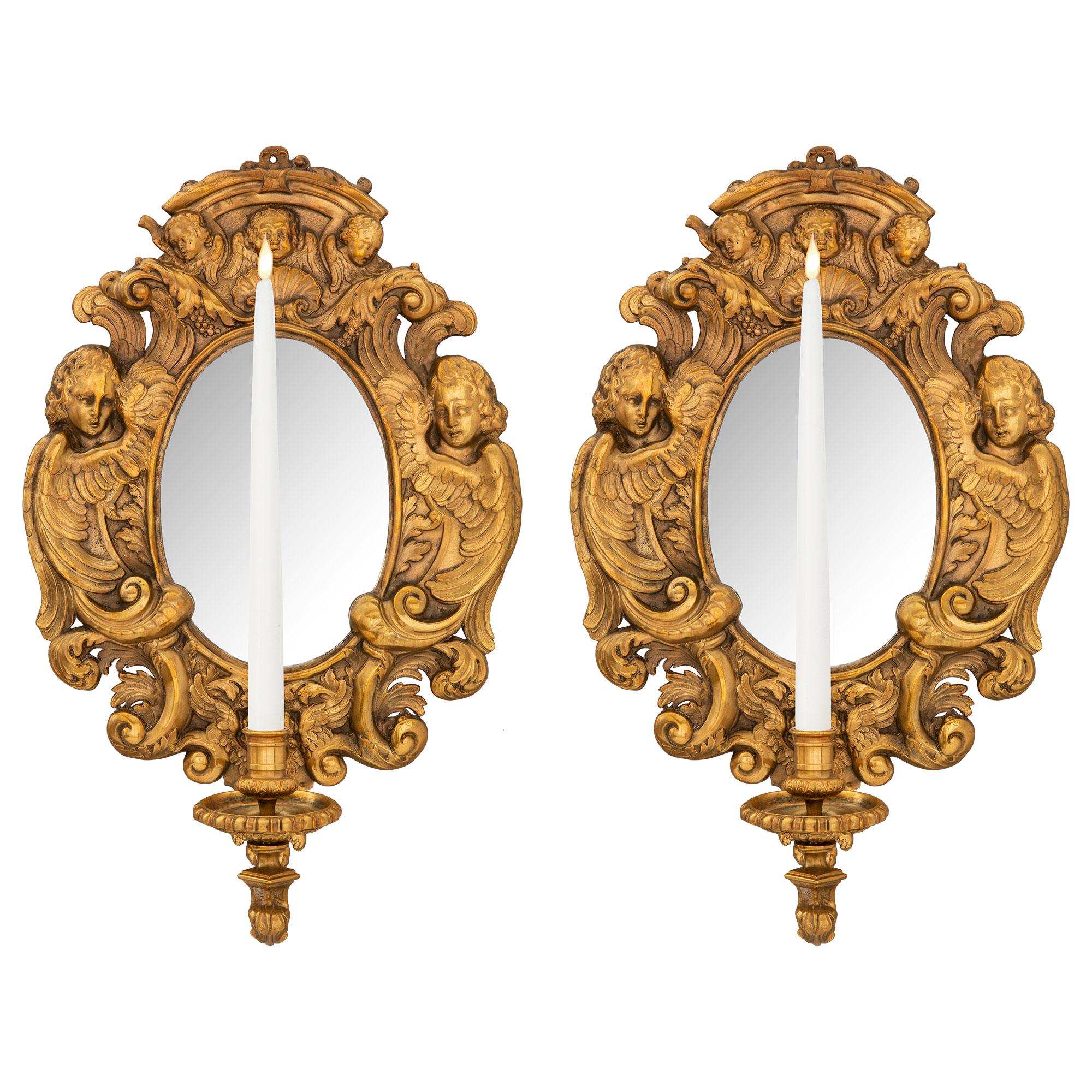 Pair of French 19th Century Baroque Style Ormolu Mirrored Sconces