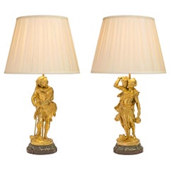 Paire de statues françaises de la période Belle poque du 19ème siècle montées sur des lampes