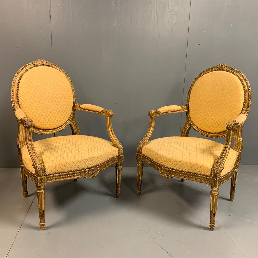 Louis XVI Pair of French 19th Century Carved Giltwood Fauteuil Armchairs For Sale