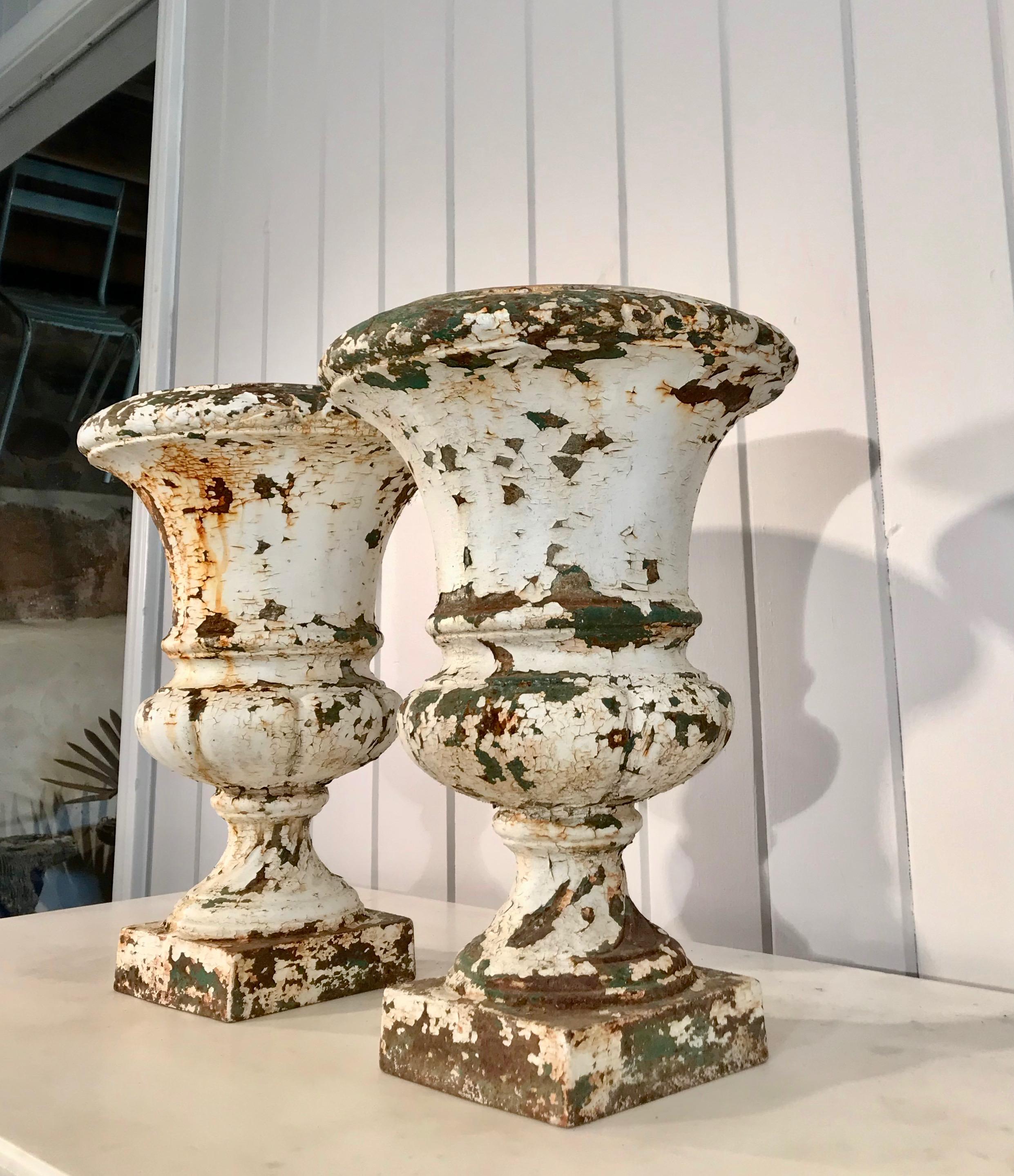 Napoleon III Pair of French 19th Century Cast Iron Medici Urns in Old Painted Surface For Sale