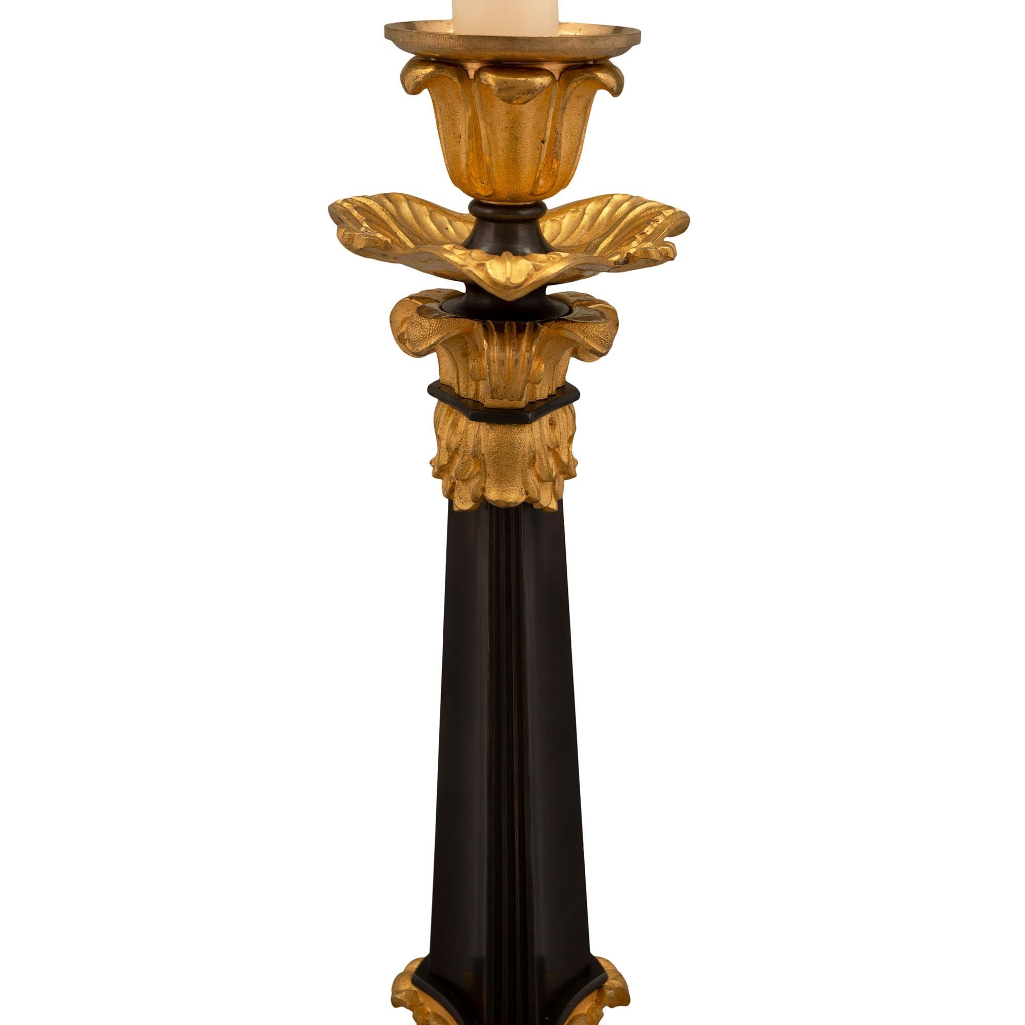 Pair of French 19th Century Charles X Period Bronze and Ormolu Candlesticks For Sale 1