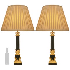 Paire de lampes en bronze patiné et bronze doré d'époque Charles X du 19ème siècle