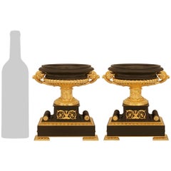 pair of French 19th century Charles X st. Ormolu and patinated Bronze urns