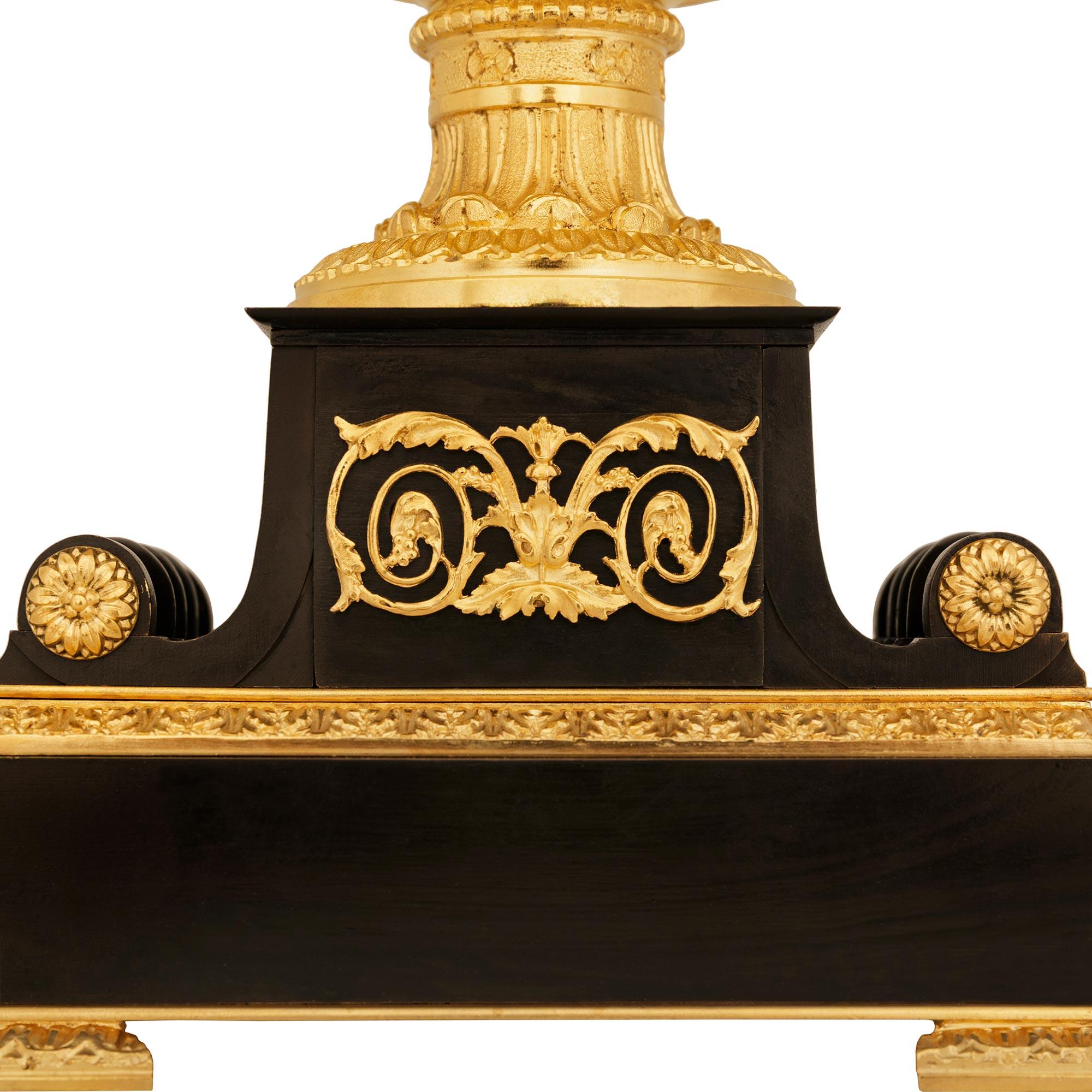 Bronzo pair of French 19th century Charles X st. Ormolu and patinated Bronze urns in vendita