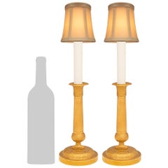 pair of French 19th century Charles X st. Ormolu candlestick lamps