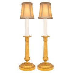 pair of French 19th century Charles X st. Ormolu candlestick lamps
