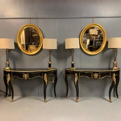Pair of French 19th Century Ebonized Console Tables with Brass Mounts