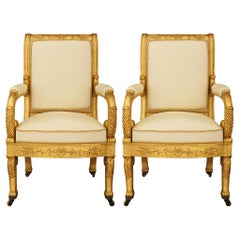 pair of French 19th century Empire st. Giltwood armchairs