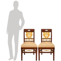 Pareja de sillas auxiliares francesas del siglo XIX de caoba y ormolu de estilo Imperio