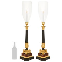 pair of French 19th century Empire st. Marble, Ormolu and patinated Bronze hurr