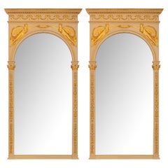 Pair of French 19th century Empire st. Patinated and Giltwood mirrors