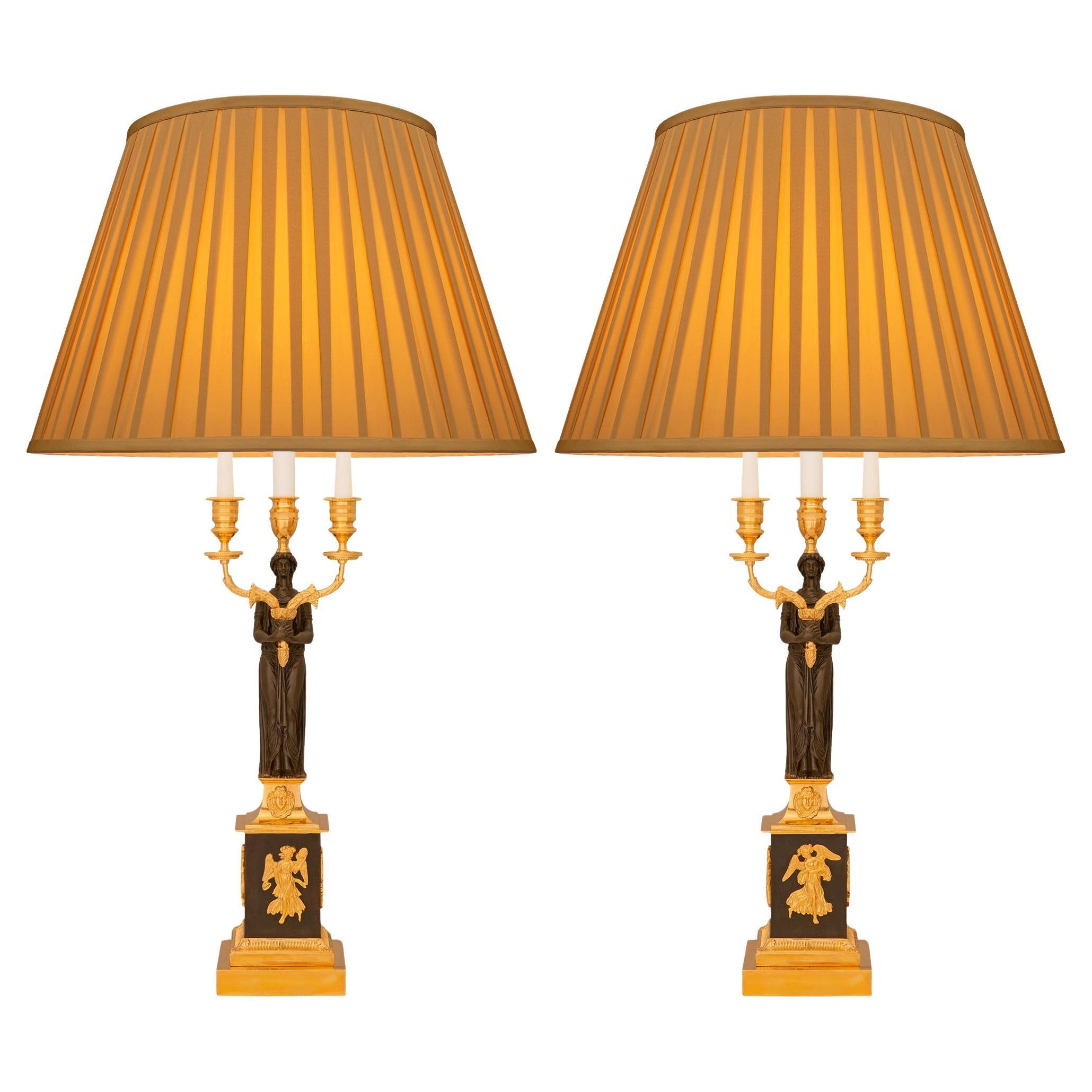 pair of French 19th century Empire st. Patinated Bronze and Ormolu lamps