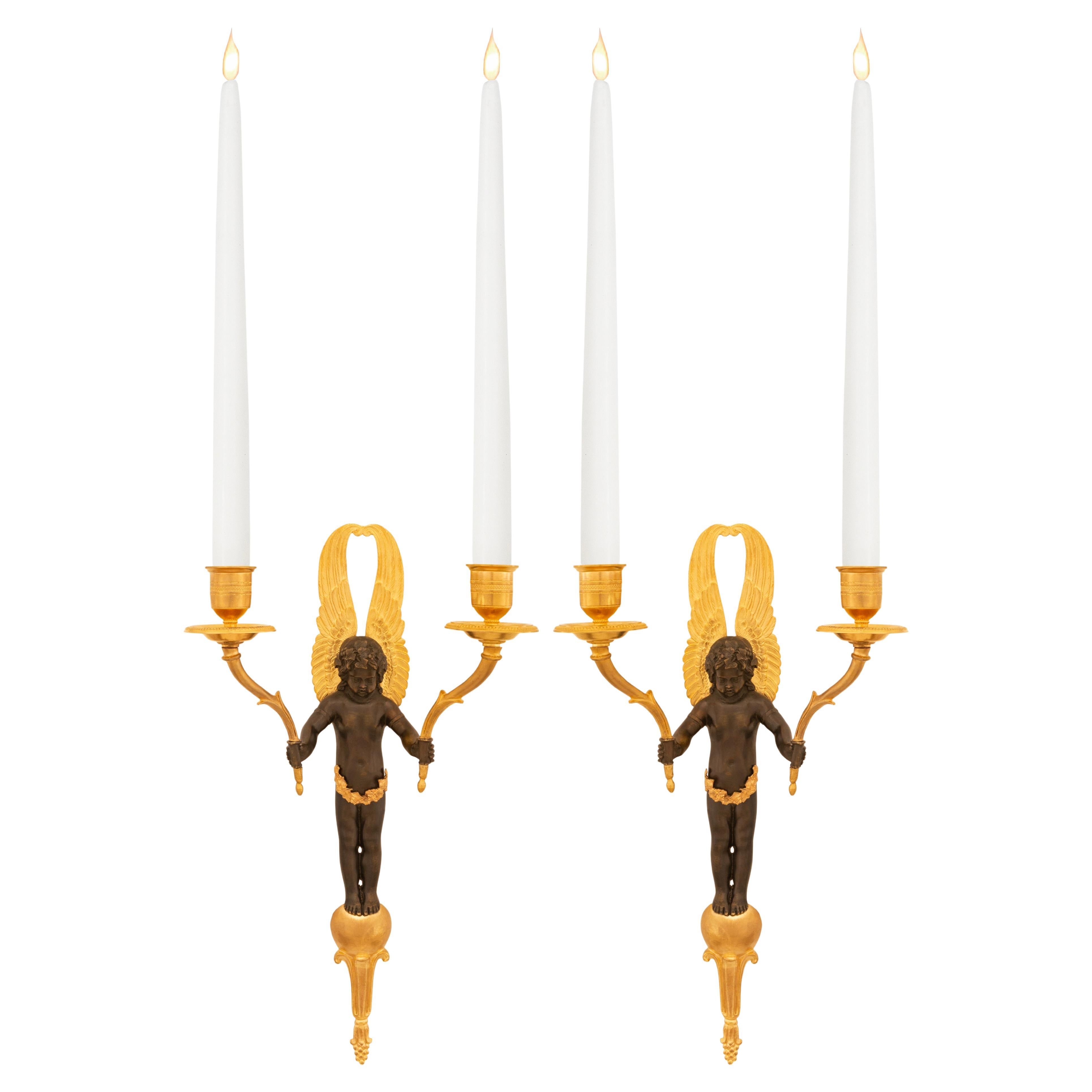 pair of French 19th century Empire st. patinated Bronze and Ormolu sconces