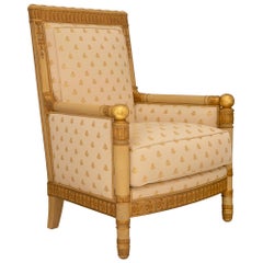 Pair Of French 19th Century Empire St. Patinated Wood And Giltwood Armchairs