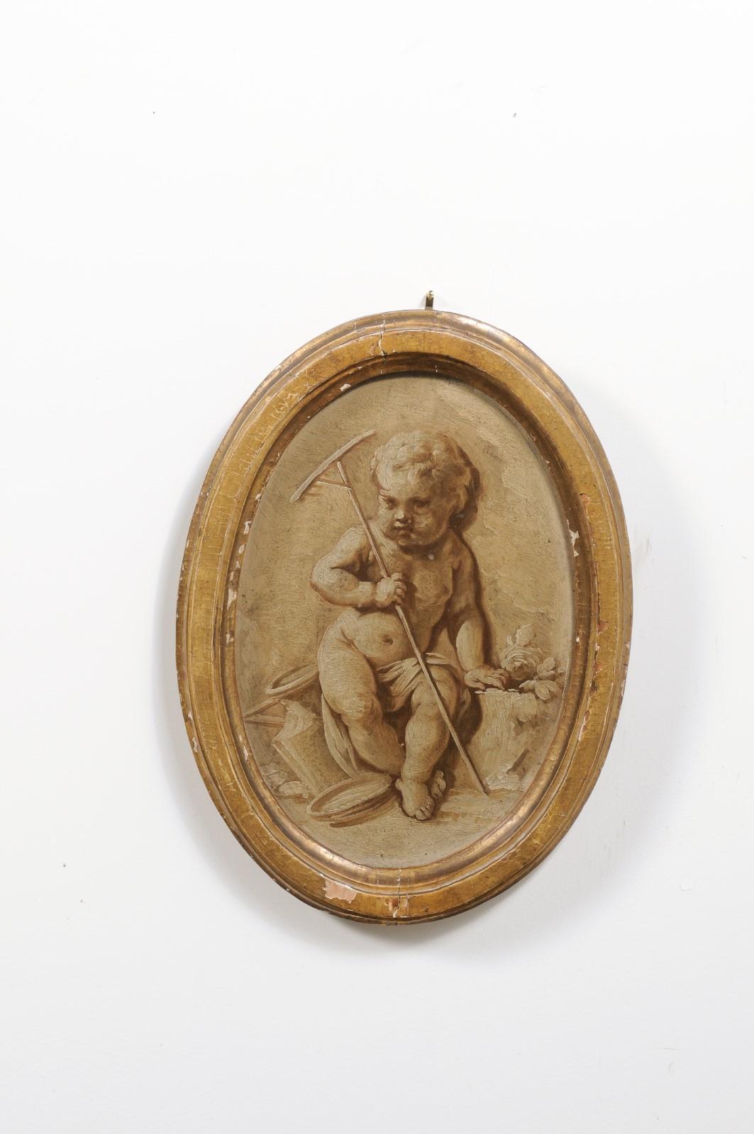 Pair of French 19th Century Framed Oval Grisaille Paintings Depicting Two Putti In Good Condition For Sale In Atlanta, GA