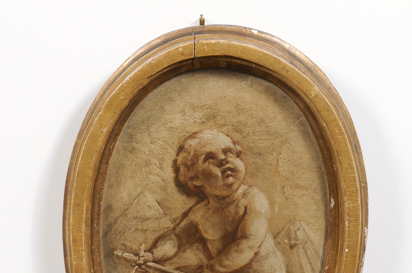 Pair of French 19th Century Framed Oval Grisaille Paintings Depicting Two Putti For Sale 2