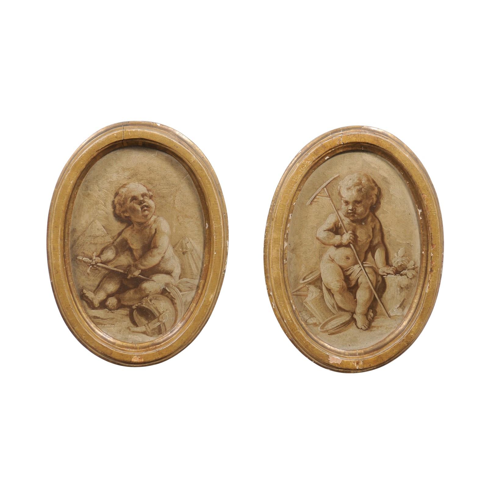 Pair of French 19th Century Framed Oval Grisaille Paintings Depicting Two Putti For Sale