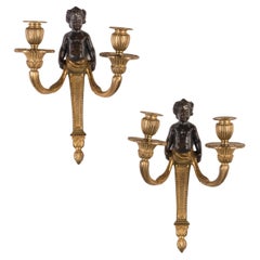 Pair of French 19th Century Gilded Bronze Wall Appliques with Patinated Putti