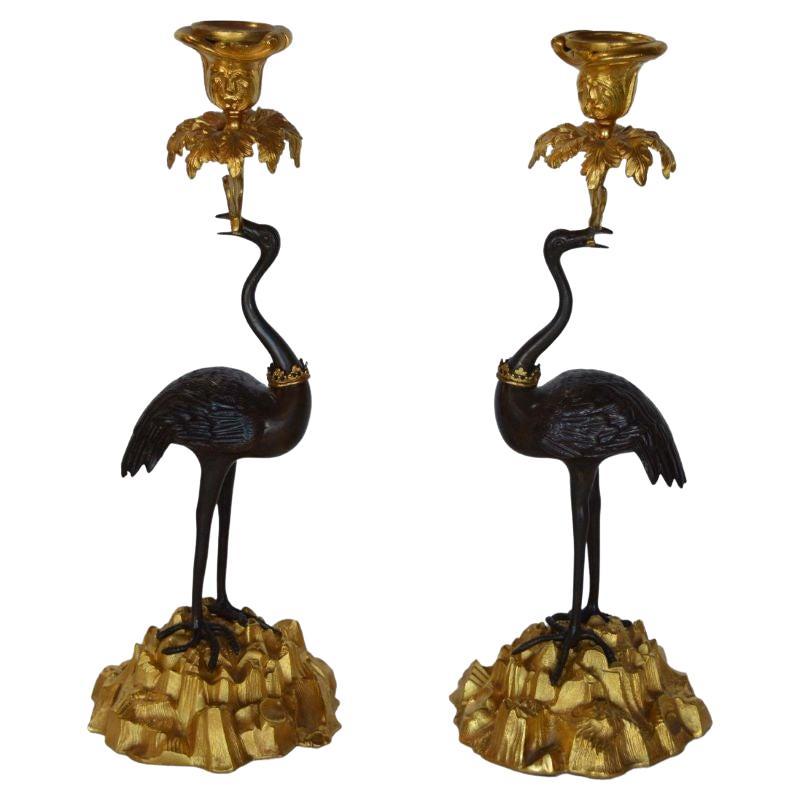 Pair of French 19th Century Gilt and Patinated Bronze Crane Candle Holders For Sale