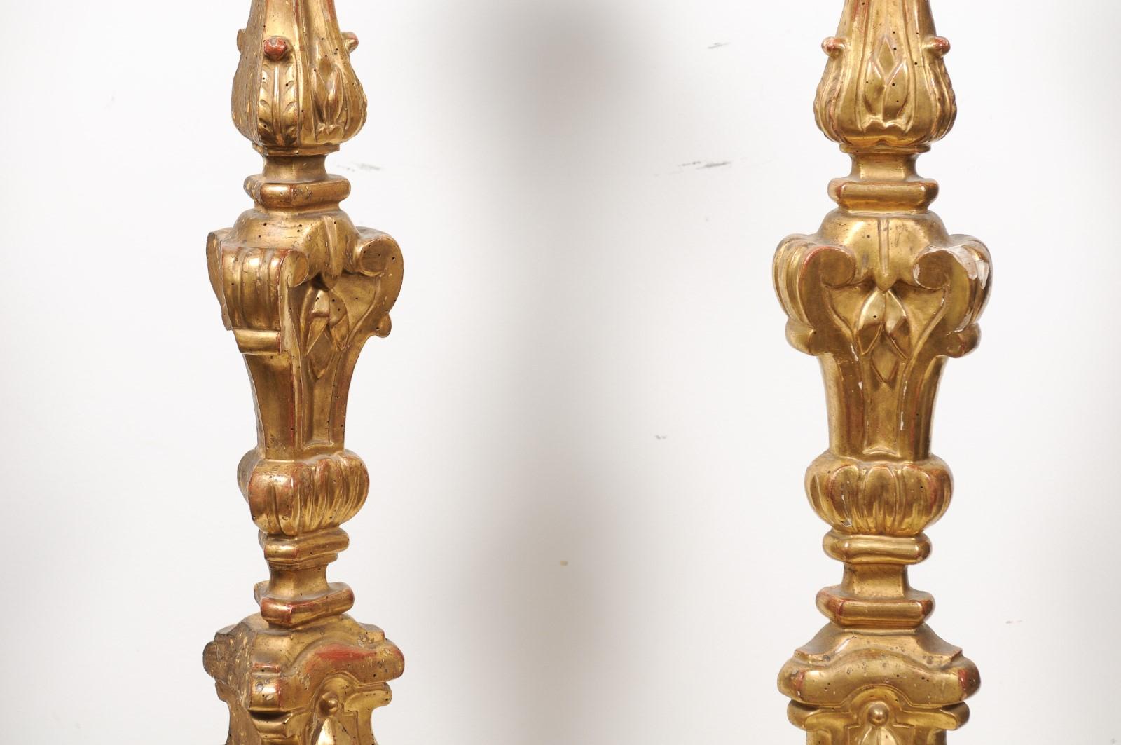 Giltwood Pair of French 19th Century Gilt Candlesticks with Carved Foliage and Volutes For Sale