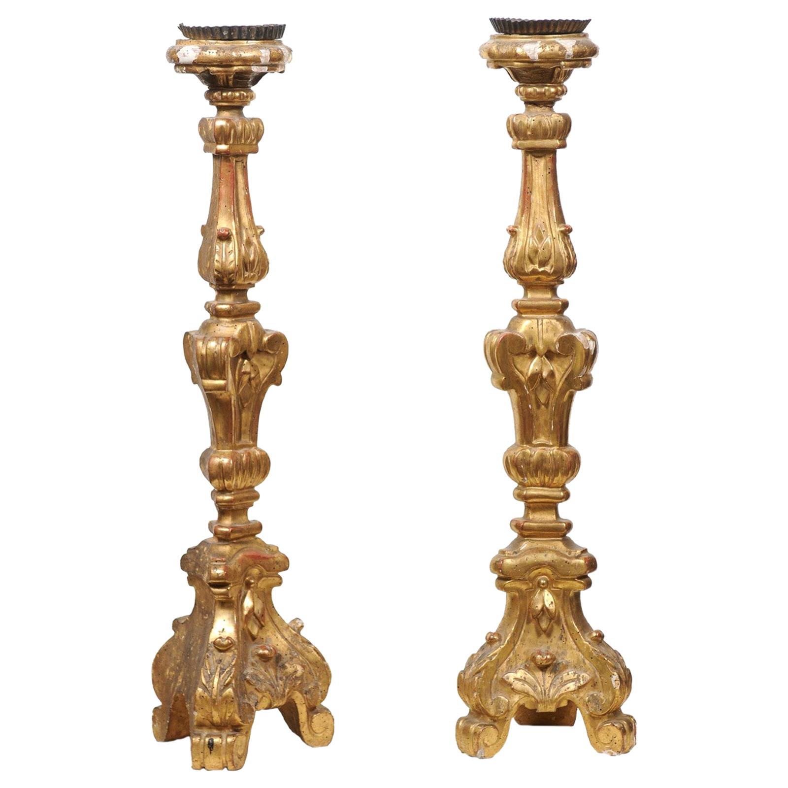 Pair of French 19th Century Gilt Candlesticks with Carved Foliage and Volutes For Sale