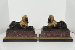 Pair of French 19th Century Gilt & Patinated Bronze Sphinxes on Porphyry & Bron