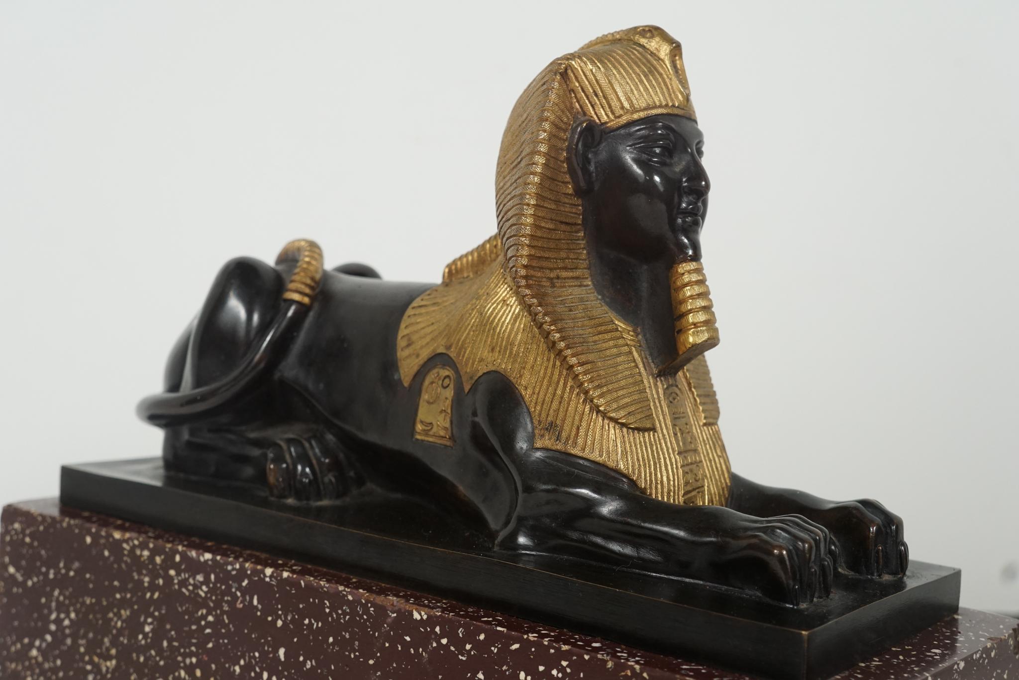 Pair of French 19th Century Gilt & Patinated Bronze Sphinxes on Porphyry & Bron For Sale 1