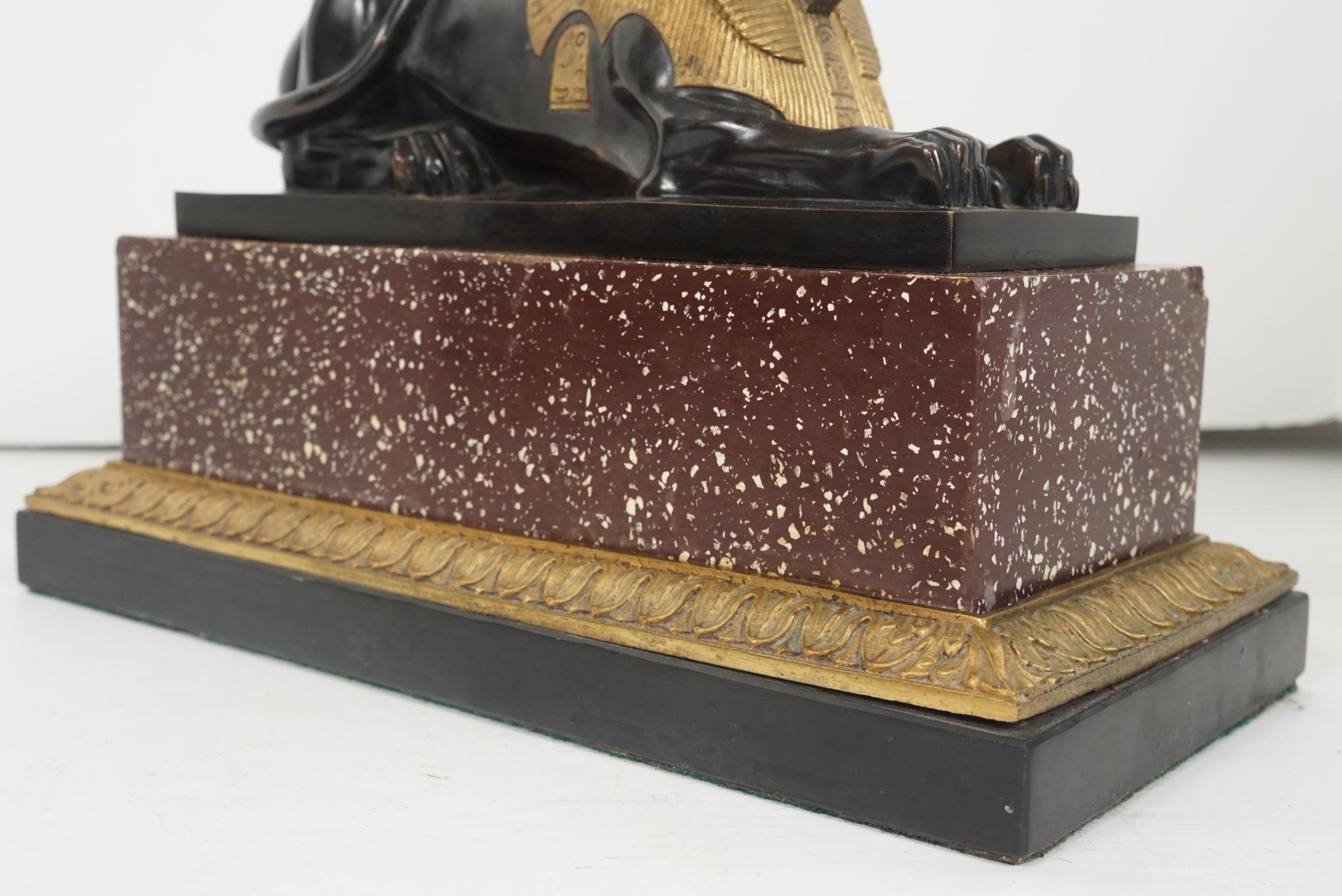 Pair of French 19th Century Gilt & Patinated Bronze Sphinxes on Porphyry & Bron For Sale 2