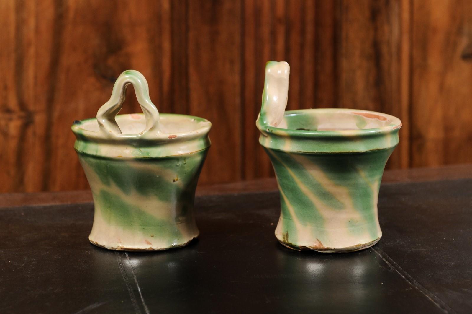Rustic Pair of French 19th Century Green and Yellow Glazed Pottery Hanging Planters For Sale
