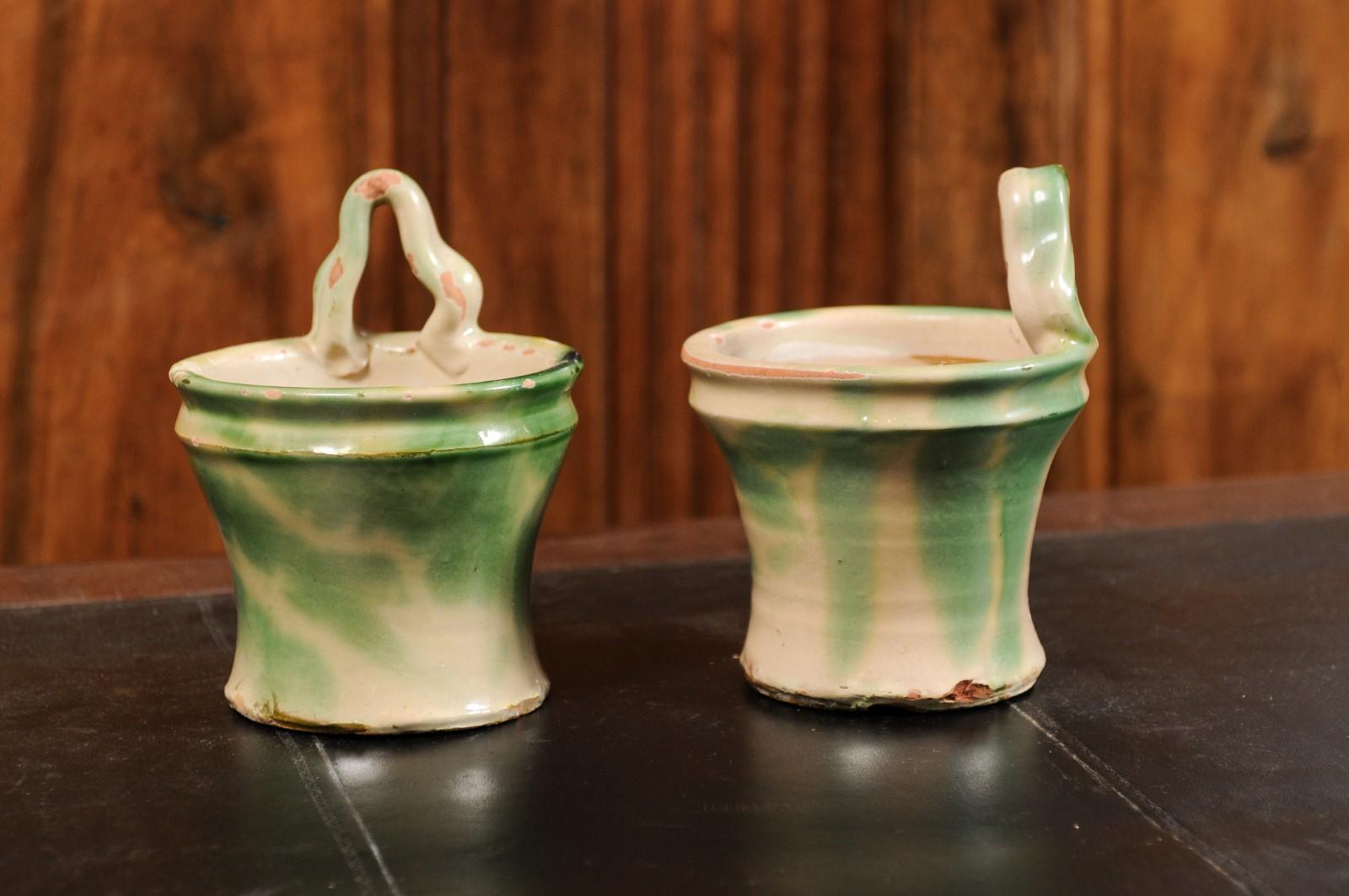 Pair of French 19th Century Green and Yellow Glazed Pottery Hanging Planters For Sale 1