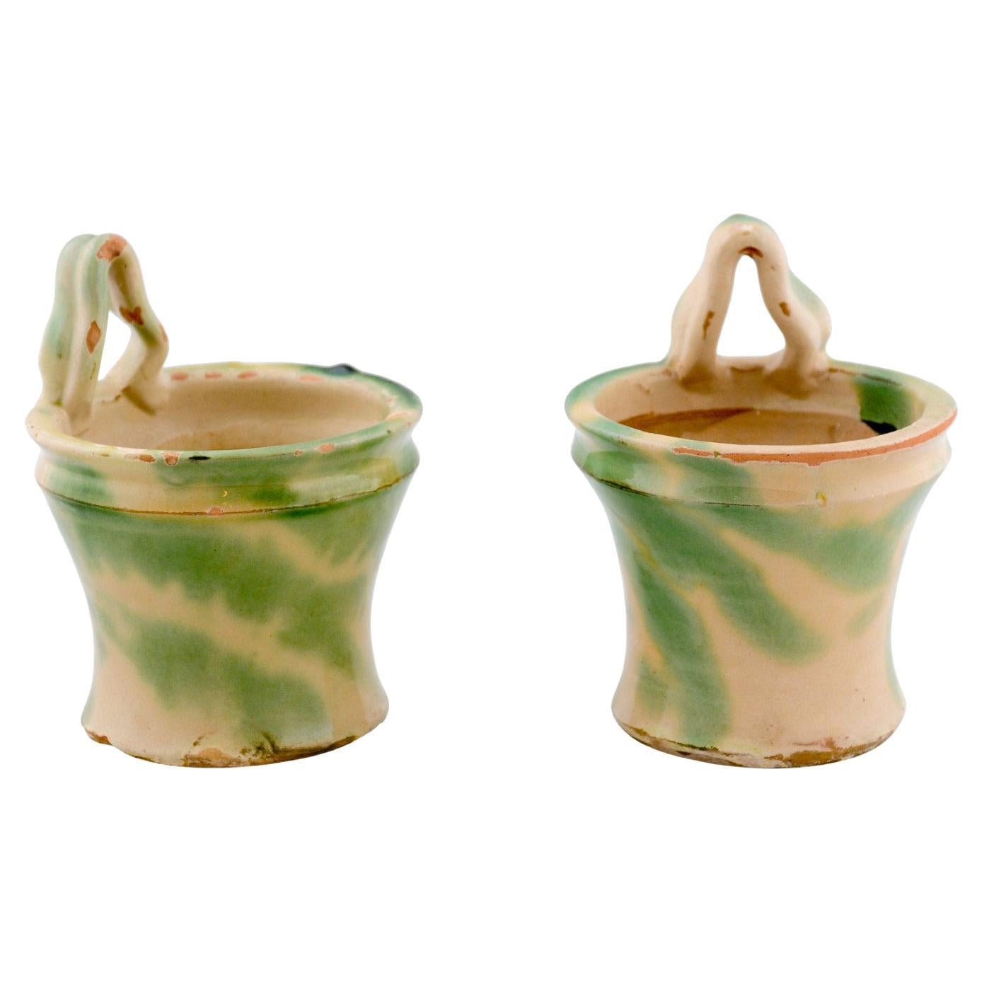 Pair of French 19th Century Green and Yellow Glazed Pottery Hanging Planters For Sale
