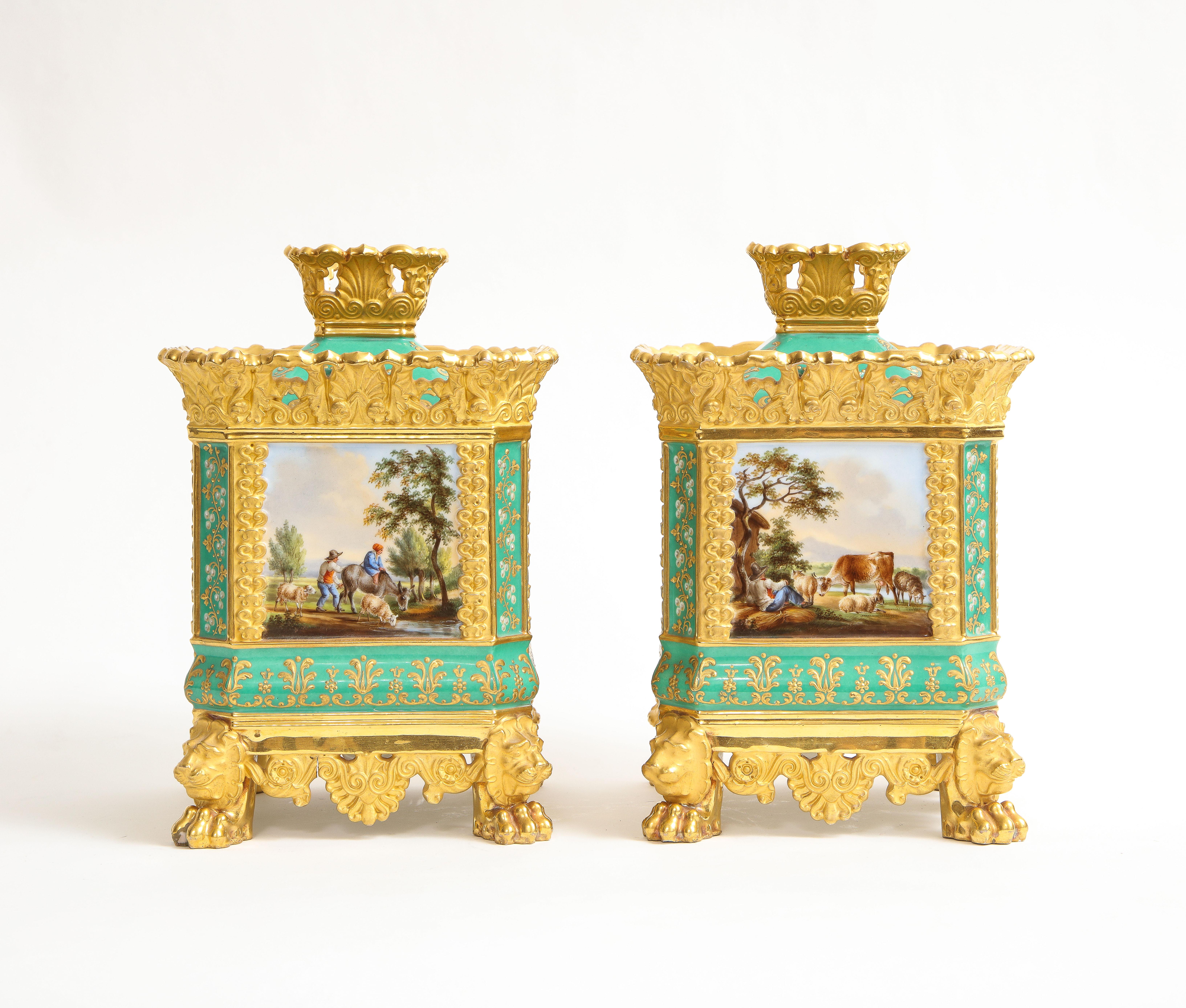 A Large Pair of French 19th Century Jacob Petit Porcelain Green-Ground Pot-Pourri Vases and Covers, Marked 'JP' on Bottom of Each.  Each is of square form with a fantastic green ground.  The covered vases are decorated with elaborate panels of