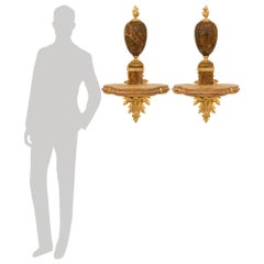 Paire de consoles murales françaises du XIXe siècle, de style Louis XV, en faux marbre et bronze doré