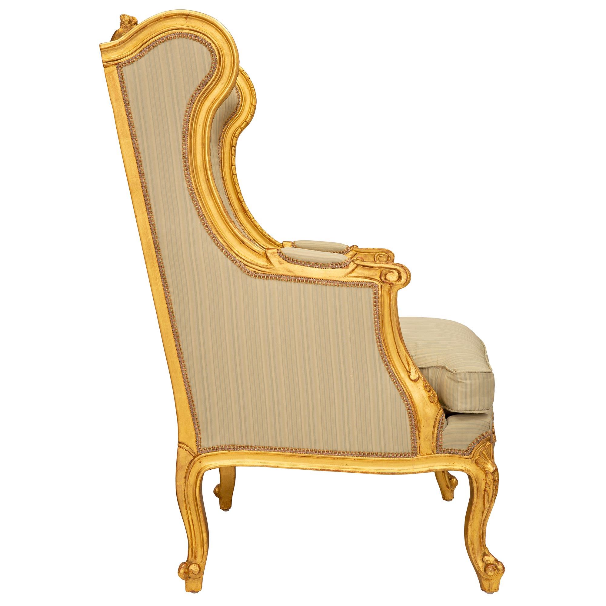 Pair of French 19th Century Louis XV St. Giltwood Bergères À Oreilles Armchairs In Good Condition For Sale In West Palm Beach, FL
