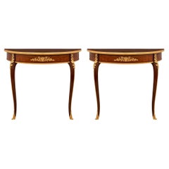 Pair of French 19th Century Louis XV St. Kingwood, Mahogany, and Ormolu Consoles