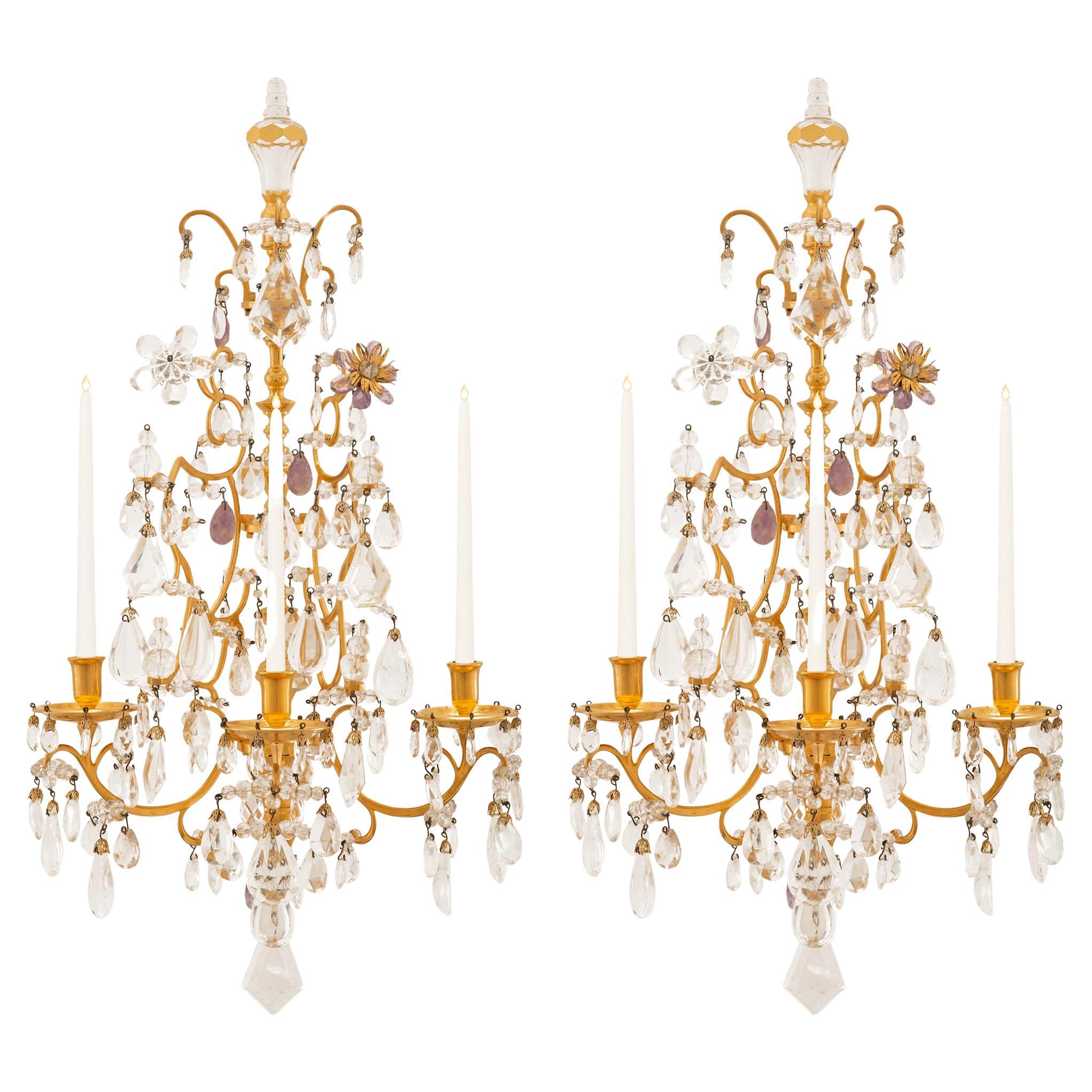 pair of French 19th century Louis XV st. Ormolu, Amethyst, and Crystal sconces