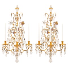 pair of French 19th century Louis XV st. Ormolu, Amethyst, and Crystal sconces