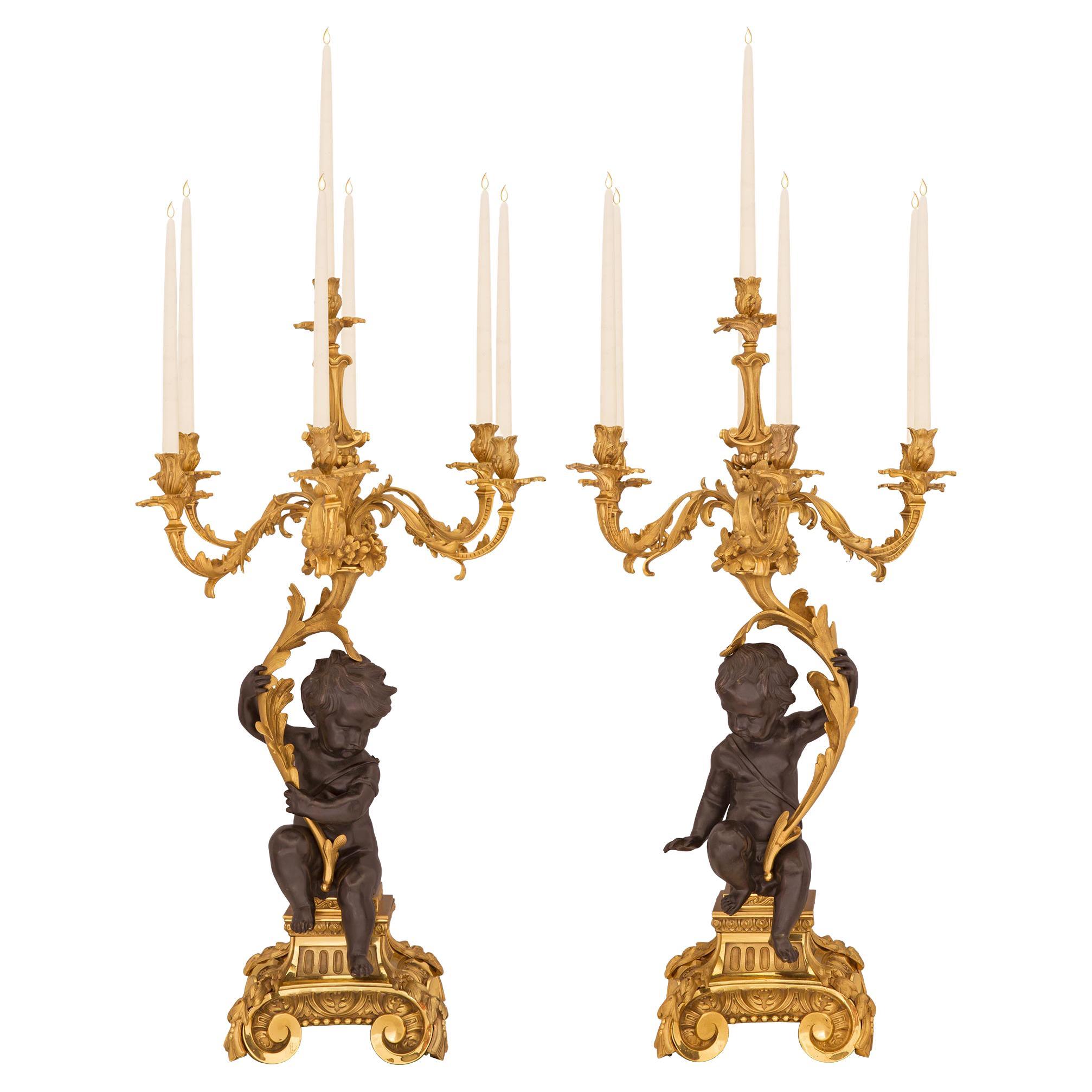 Pair of French 19th Century Louis XV St. Ormolu and Patinated Bronze Candelabras