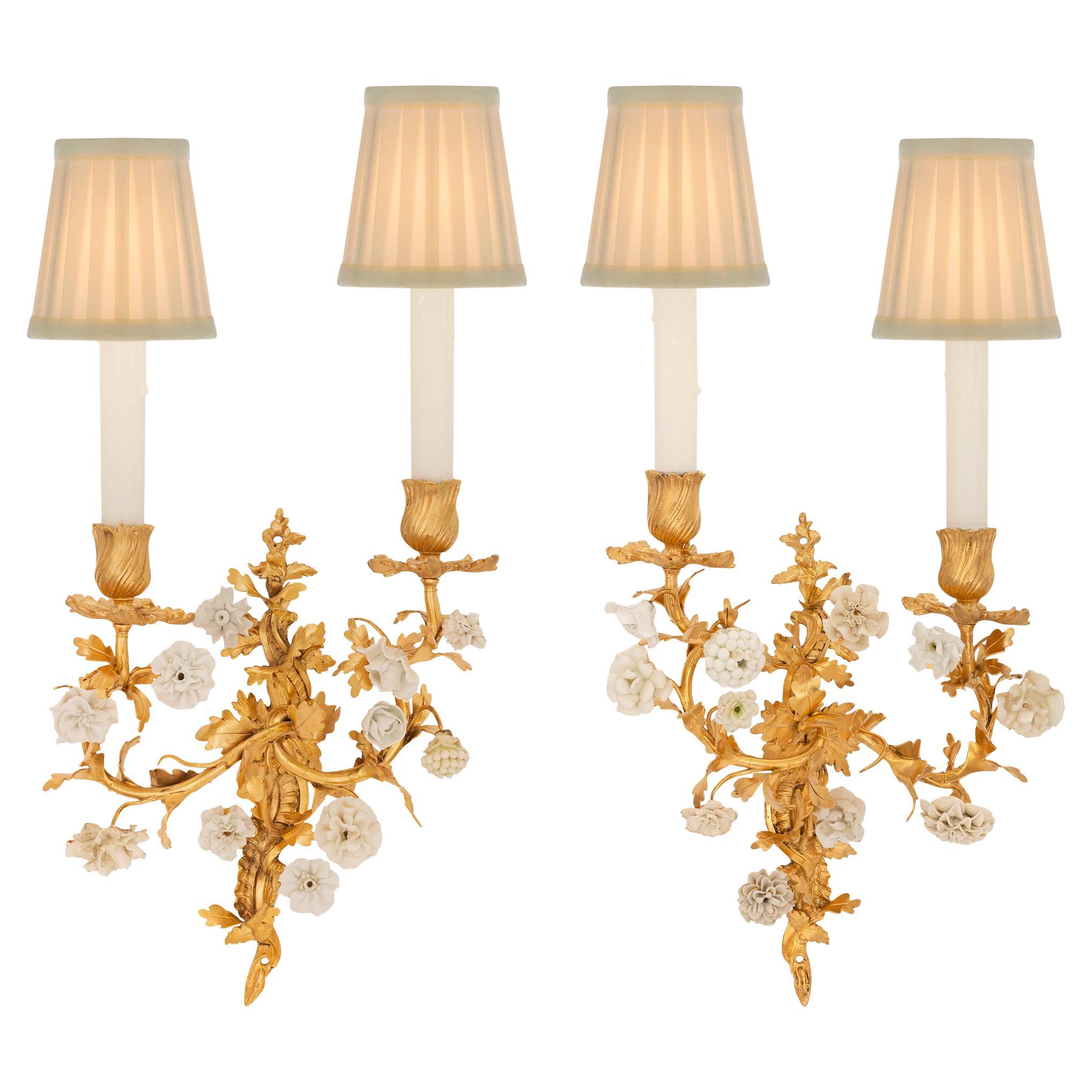 Pair of French 19th Century Louis XV St. Ormolu and Porcelain Sconces