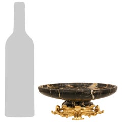 pair of French 19th century Louis XV st. Ormolu and Portoro marble centerpieces