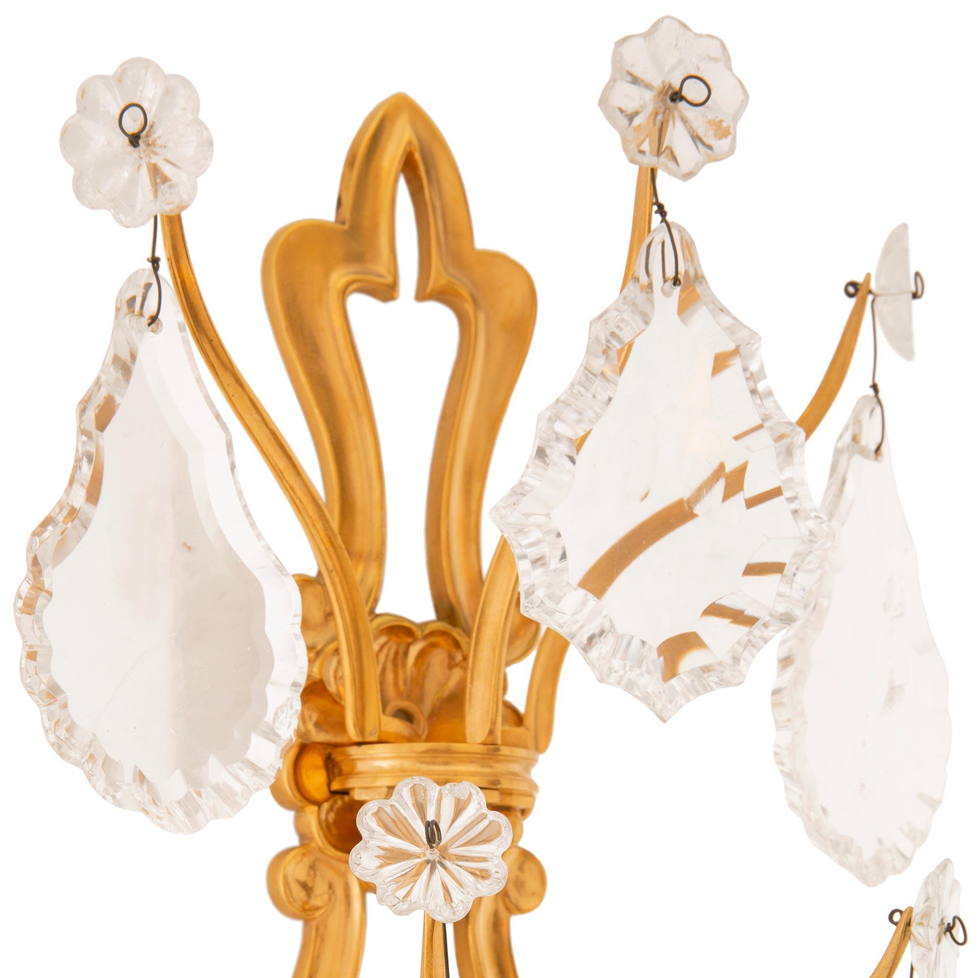 Pair Of French 19th Century Louis XV St. Ormolu And Rock Crystal Sconces For Sale 1