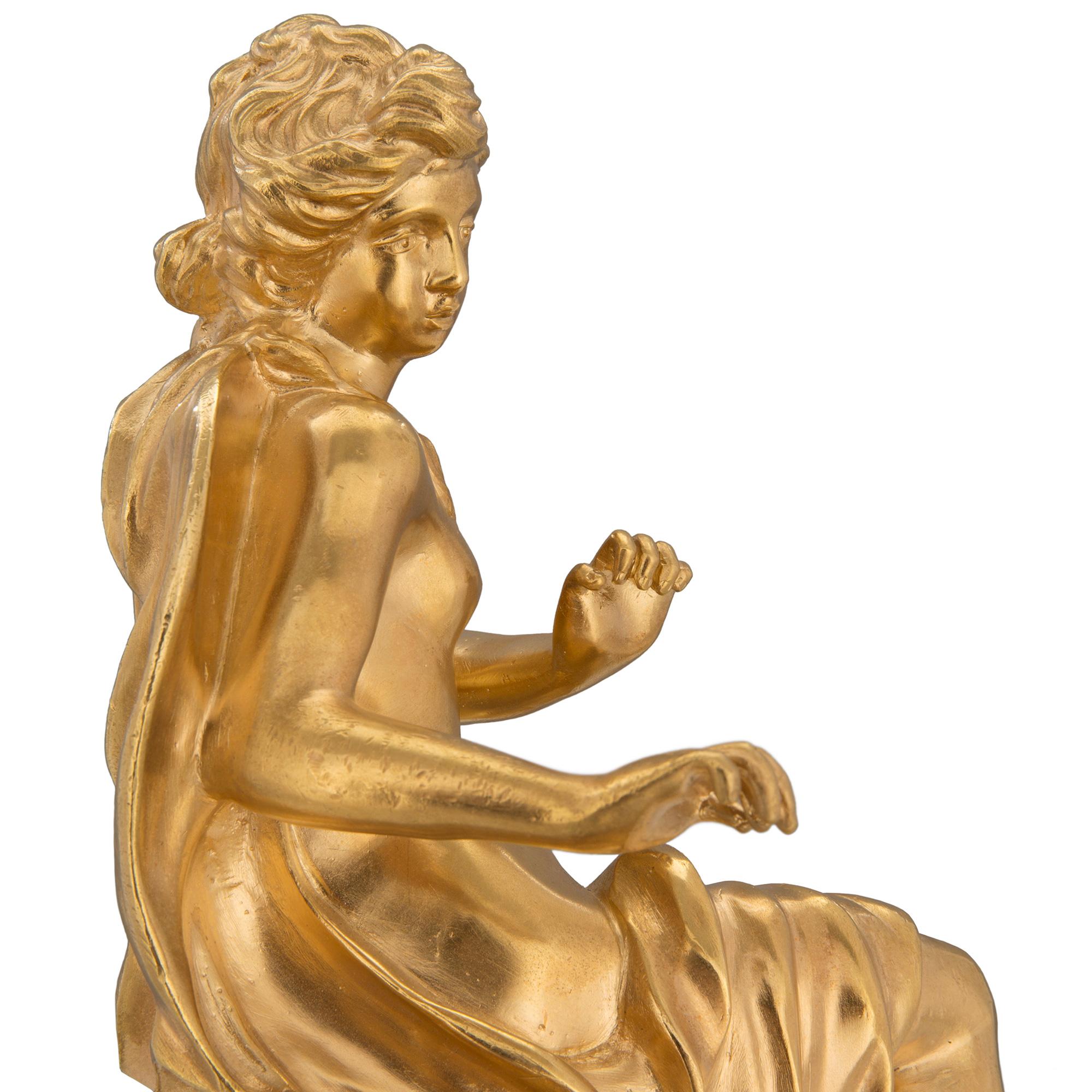 Bronze doré Paire de chenets Louis XV en bronze doré du 19ème siècle français en vente