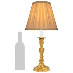 Paire de lampes en bronze doré Louis XV du 19ème siècle, signées G.G.