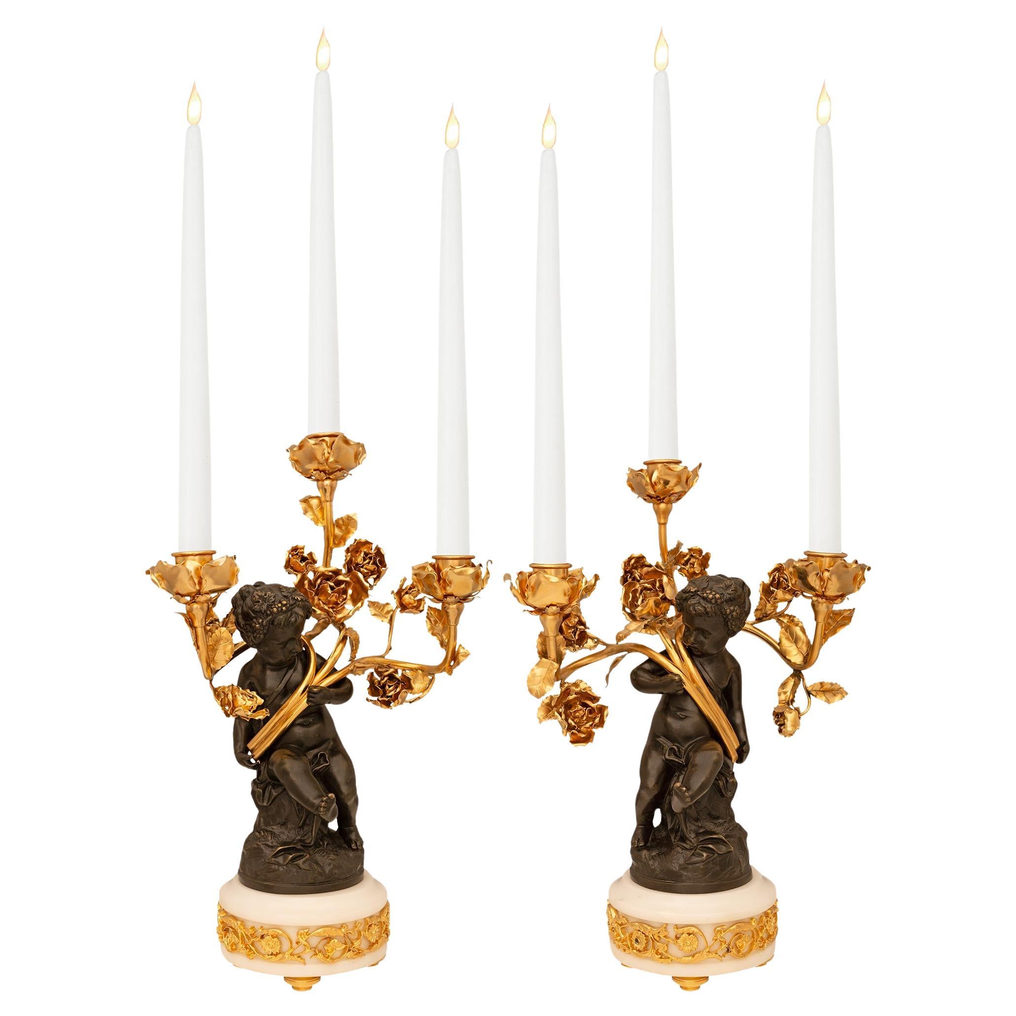 pair of French 19th century Louis XV st. Ormolu, Marble and Bronze candelabras