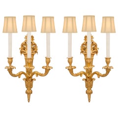 Pair of French 19th Century Louis XV St. Ormolu Sconces