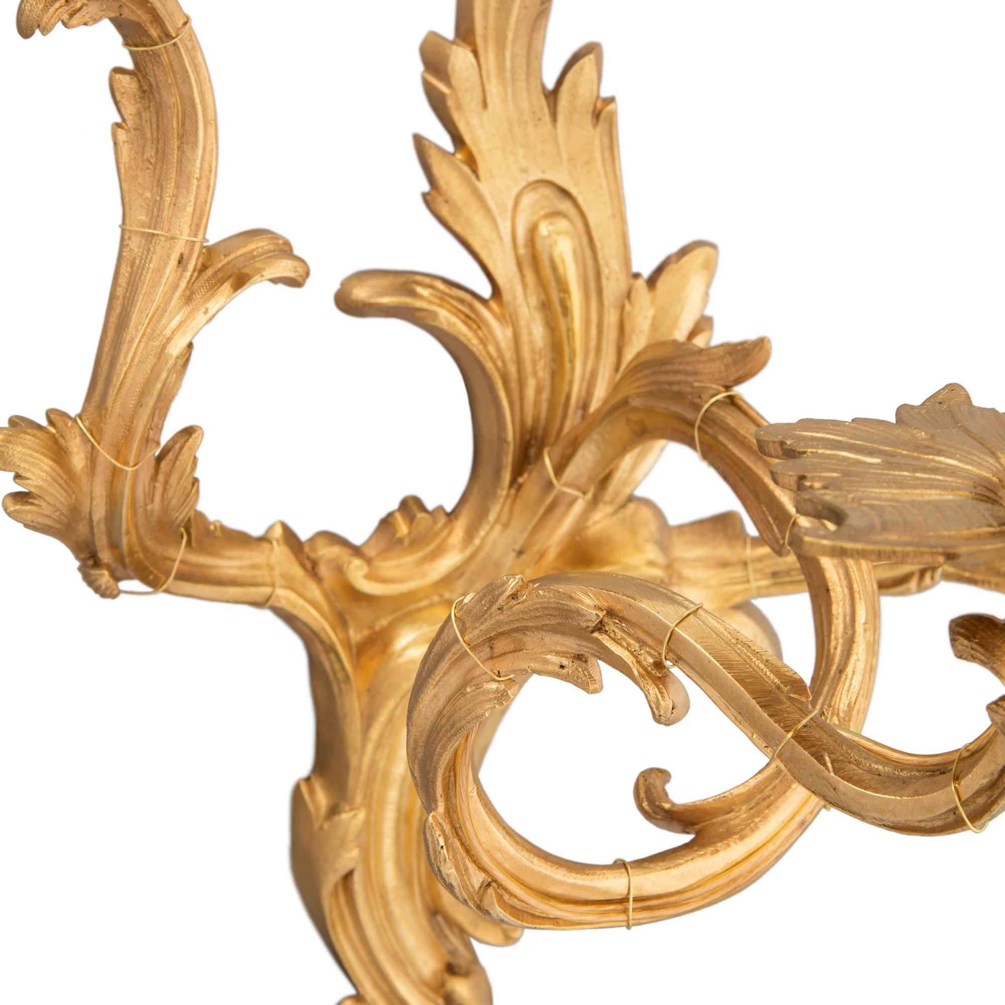 Pair of French 19th Century Louis XV St. Ormolu Three-Arm Sconces For Sale 2